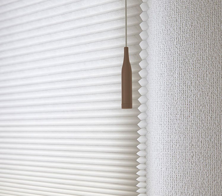 Blind material or installed interior